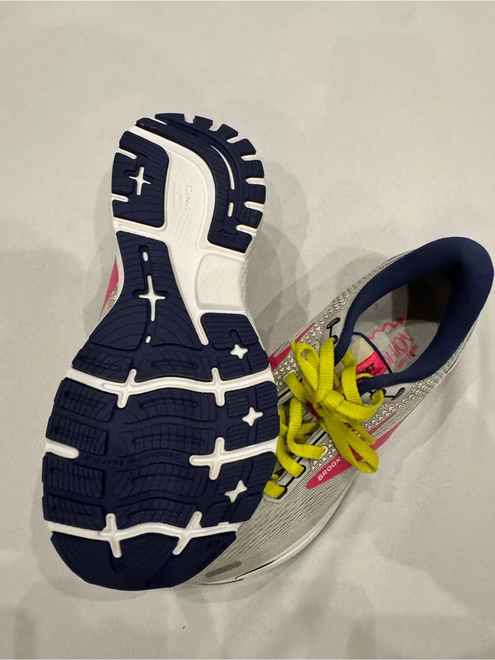 NEW. Brooks Kids Sneakers in Light Gray with Neon Yellow & Pink Accents